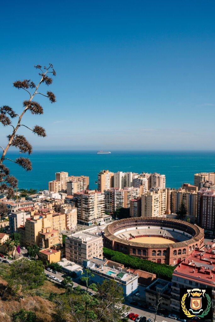 Explore Málaga's iconic bullring and coast from a breathtaking vantage point.